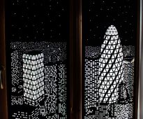 About roller blinds Night city with perforation