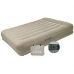 Inflatable bed with headrest