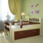 wide children's bed with sides