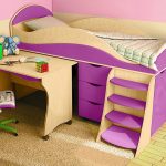 purple bed with a side for the nursery