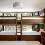 four bunk beds by the window