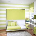 Horizontal folding bed in light green tones