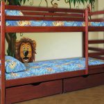 wooden bed in the nursery