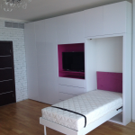 feminine bedroom with built-in bed