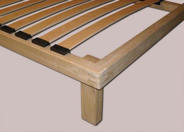Fixing slats to the base of the bed