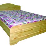 bed with bright mattress