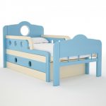 Sliding baby bed in blue tones