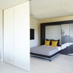 Stylish interior with a transforming bed