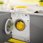 skalbimo mašina pilka geltona ausine