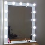 dressing room table with a large mirror