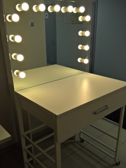 light make-up table with a mirror