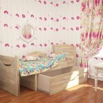 Spacious wooden childrens sliding bed