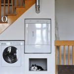 built-in appliances under the stairs