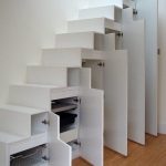 built-in lockers under the stairs