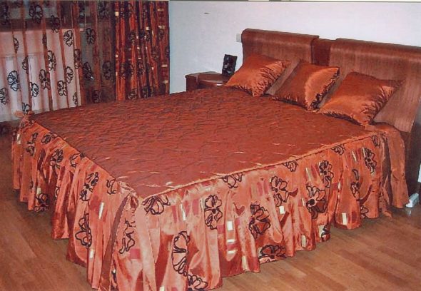 Bright bedspread on the bed