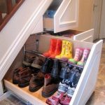shoe boxes under the stairs