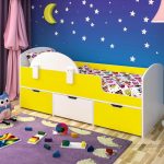 yellow children's bed with sides