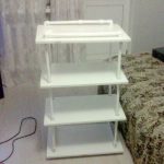 Plastic bookcase with hands