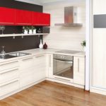 White kitchen with red color