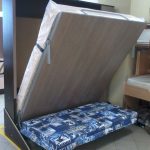 Folding bed with a sofa comfort