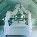canopy bed in the attic