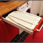 ironing board in the kitchen