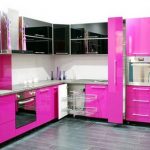 the kitchen is black and pink