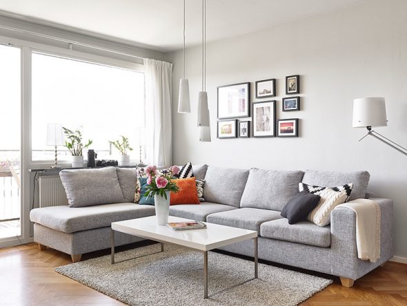 gray sofa with gray wallpaper