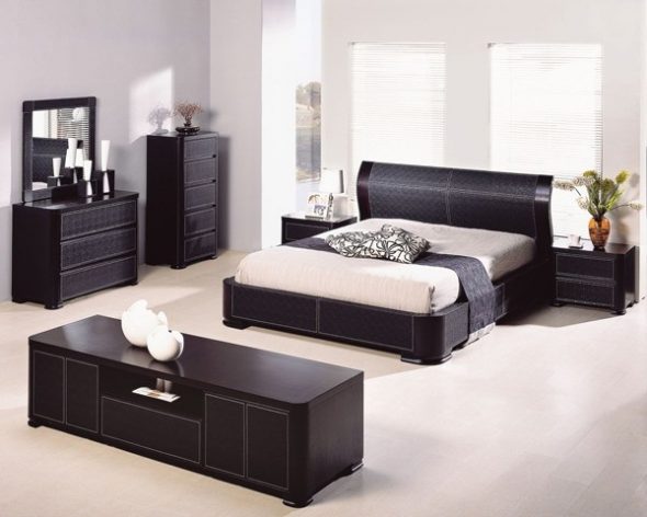 bright bedroom with dark furniture