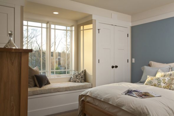 built-in closets on the sides of the window