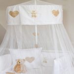 The canopy on the crib can be decorated with embroidery or thermo stickers