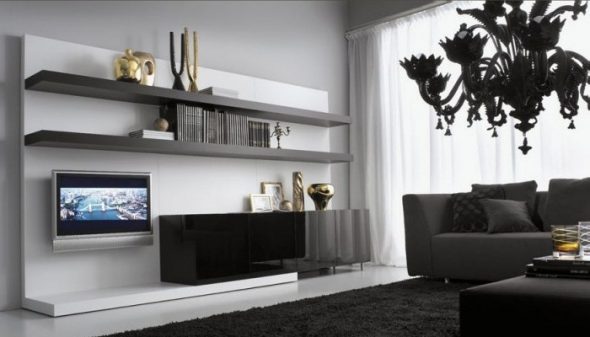 Black furniture in the living room interior