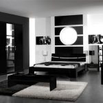 Black furniture in the interior of the bedroom photo