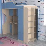 Children's bed attic Bambi-11 with a working area and cabinets