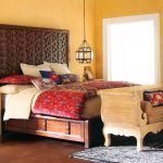 wooden double beds in the bedroom