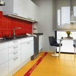 white kitchen set with red