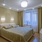 Sconce sa ibabaw ng bedroom light bed