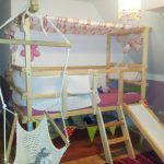children's bed an attic with a hill