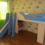 children's bed an attic with a hill for the school student