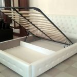 white lifting bed