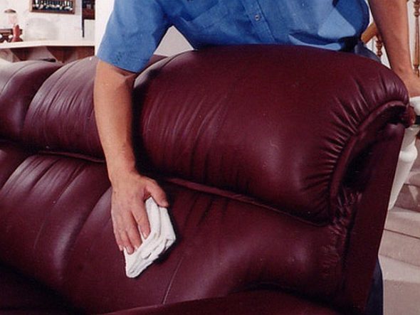 clean the sofa with a napkin