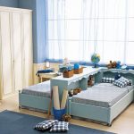 a bedroom for two children in blue