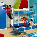 a bedroom for two boys in blue