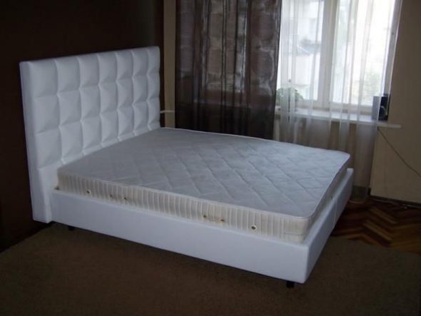 Beds with soft headboard