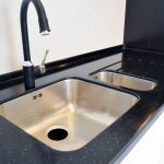 Sink under a table-top from an artificial stone