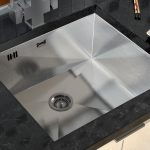 Sink under a table-top from an artificial stone original