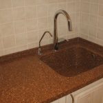 Countertop with sink made of artificial stone will be an excellent complement to any interior