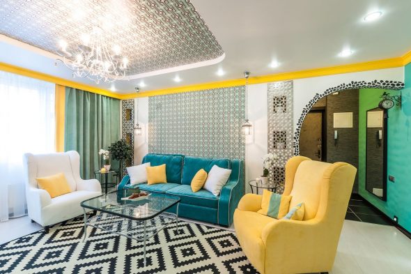 turquoise sofa with yellow