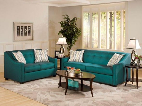 turquoise sofa in beige interior