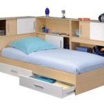 children's bed with sides and shelves